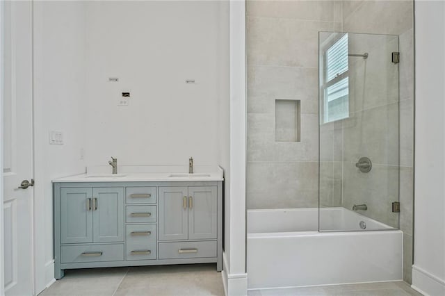 5310 Laurel St, New Orleans, LA 70115 - full bath with enclosed tub / shower combo, double vanity, and tile patterned floors