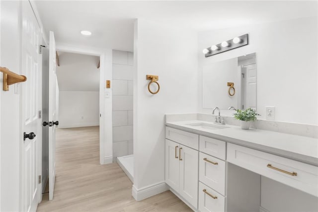 313 Post Dr, Luling, LA 70070 - full bath featuring vanity and wood finished floors