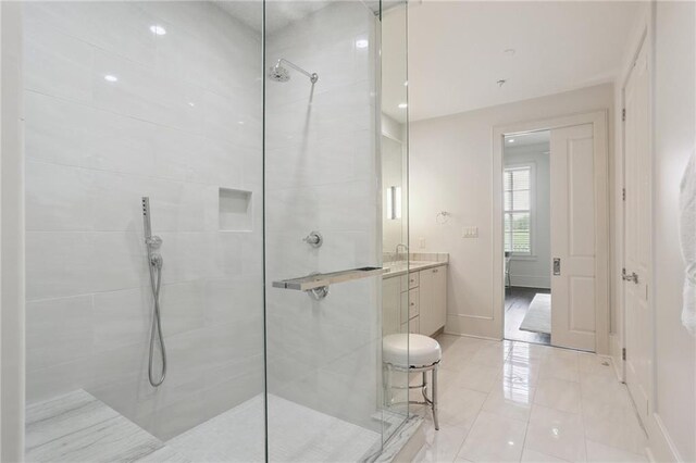 111 Audubon St Unit 202, New Orleans, LA 70118 - full bathroom with a walk in shower, vanity, and tile patterned flooring