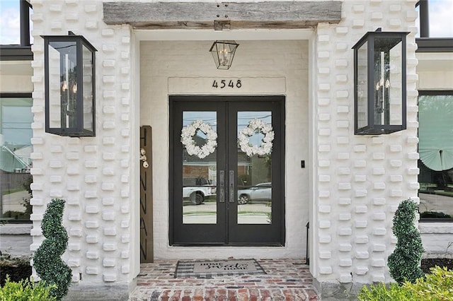 4548 Alphonse Dr, Metairie, LA 70006 - doorway to property featuring french doors and stone siding