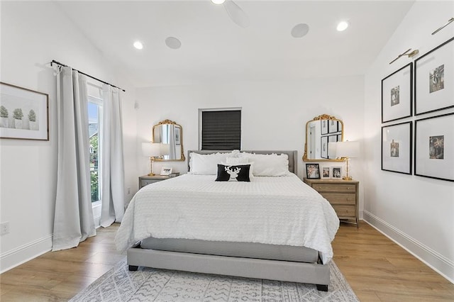 4548 Alphonse Dr, Metairie, LA 70006 - bedroom with vaulted ceiling, light wood-style flooring, and recessed lighting