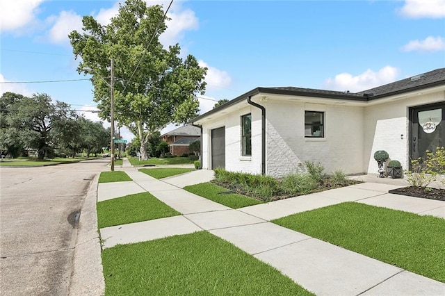 4548 Alphonse Dr, Metairie, LA 70006 - view of side of property with a lawn