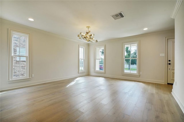 2232 N Starrett Rd, Metairie, LA 70003 - empty room with a chandelier, crown molding, light wood finished floors, and recessed lighting