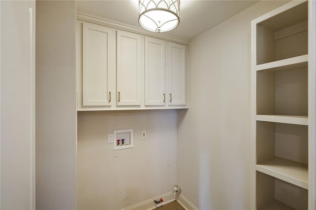 2232 N Starrett Rd, Metairie, LA 70003 - laundry area featuring cabinet space and washer hookup