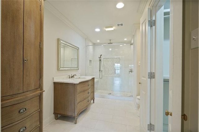 2232 N Starrett Rd, Metairie, LA 70003 - bathroom with a stall shower, vanity, tile patterned flooring, ornamental molding, and recessed lighting