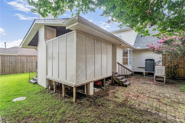 2232 N Starrett Rd, Metairie, LA 70003 - view of side of property featuring entry steps and a central AC unit