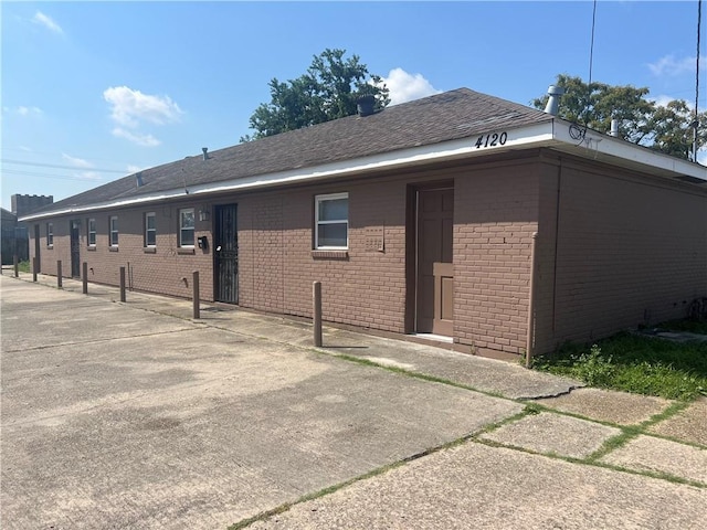 412024 Erato St, New Orleans, LA 70125 - exterior space featuring brick siding