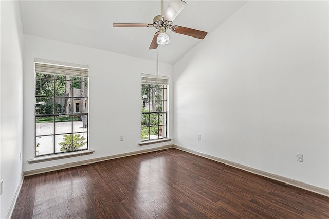 32 S Court Villa Dr Unit 32, Mandeville, LA 70471 - spare room with dark wood finished floors, ceiling fan, and high vaulted ceiling