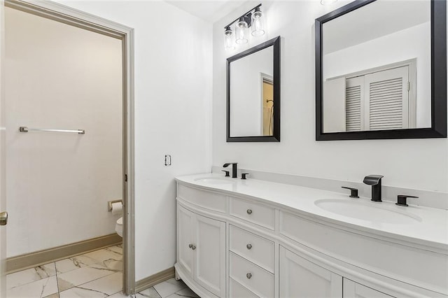 32 S Court Villa Dr Unit 32, Mandeville, LA 70471 - bathroom with marble look tile flooring and double vanity