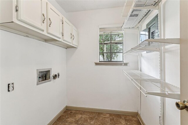 32 S Court Villa Dr Unit 32, Mandeville, LA 70471 - washroom featuring hookup for a washing machine and cabinet space