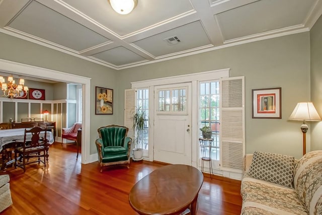 2410 Adams St, New Orleans, LA 70125 - foyer featuring coffered ceiling, wood finished floors, a chandelier, ornamental molding, and beamed ceiling