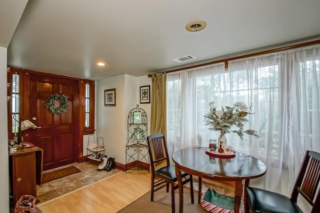 2410 Adams St, New Orleans, LA 70125 - dining area with light wood-style flooring and recessed lighting