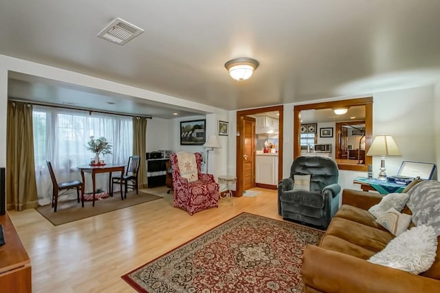 2410 Adams St, New Orleans, LA 70125 - living area with wood finished floors