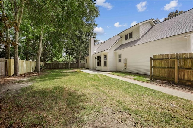 773 Rue Calais, Mandeville, LA 70471 - fenced backyard featuring a patio area