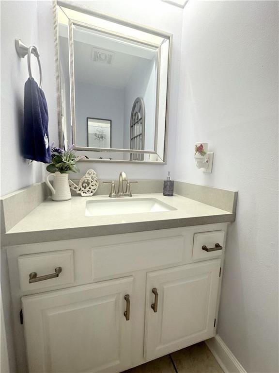4908 David Dr, Kenner, LA 70065 - bathroom with vanity and tile patterned floors