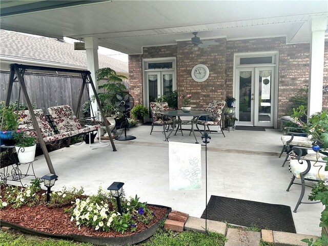 4908 David Dr, Kenner, LA 70065 - view of patio with ceiling fan and french doors
