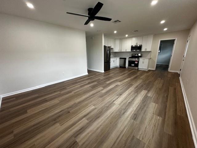 1018 Marian Ave, Metairie, LA 70001 - unfurnished living room featuring recessed lighting, ceiling fan, and dark wood-style floors