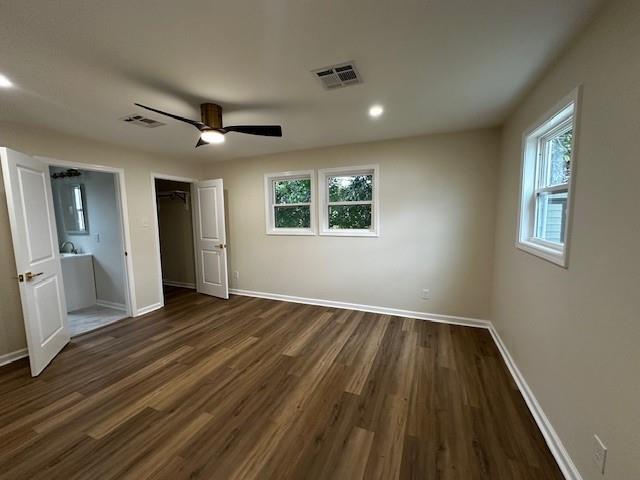 1018 Marian Ave, Metairie, LA 70001 - unfurnished bedroom featuring dark wood-style flooring, a closet, ceiling fan, and recessed lighting