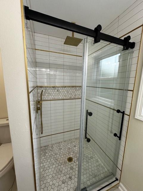 1018 Marian Ave, Metairie, LA 70001 - bathroom with toilet and a stall shower