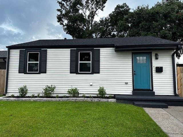 1018 Marian Ave, Metairie, LA 70001 - view of front facade with a shingled roof