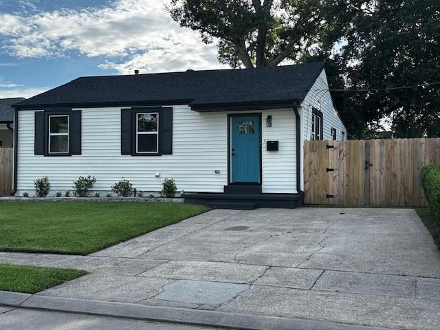1018 Marian Ave, Metairie, LA 70001 - ranch-style house with a gate