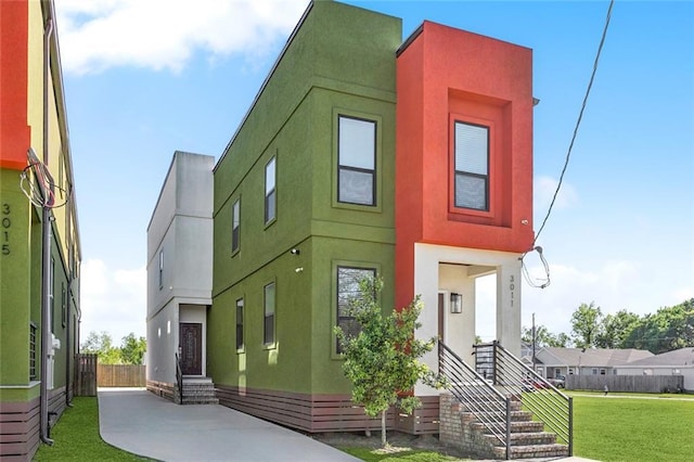 301113 Wall Blvd, New Orleans, LA 70114 - contemporary house with stucco siding