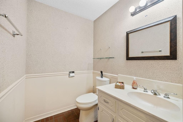 708 W Colorado Ave, Hammond, LA 70401 - half bathroom with vanity and a textured ceiling
