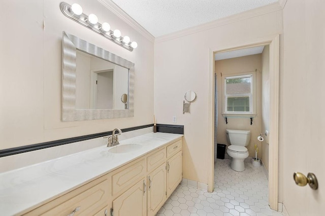 708 W Colorado Ave, Hammond, LA 70401 - bathroom with vanity, tile patterned flooring, ornamental molding, and a textured ceiling