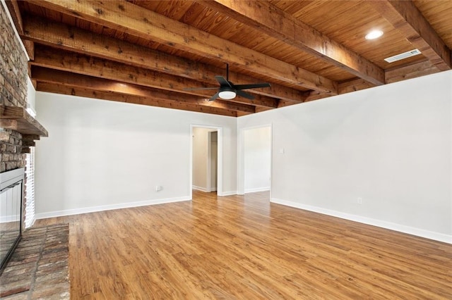 811 Franklin Ct, Slidell, LA 70458 - unfurnished living room with a wood ceiling with exposed beams, wood finished floors, a ceiling fan, a brick fireplace, and recessed lighting