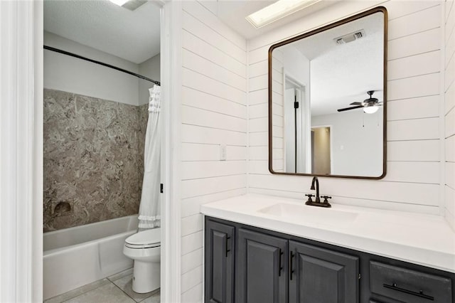 811 Franklin Ct, Slidell, LA 70458 - bathroom featuring vanity, shower / bath combination with curtain, tile patterned flooring, and a ceiling fan