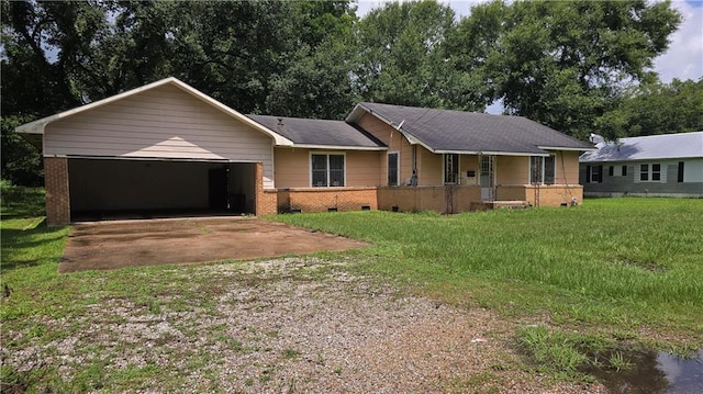 221 College Rd, Eunice, LA 70535 - ranch-style home featuring driveway, a garage, a porch, and a front yard