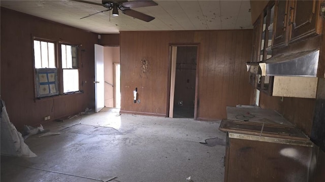 221 College Rd, Eunice, LA 70535 - foyer entrance with a ceiling fan and wooden walls