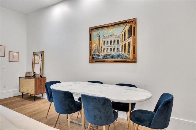 5940 Magazine St Unit 102, New Orleans, LA 70115 - dining room featuring wood finished floors and baseboards