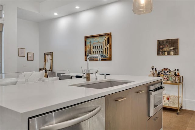 5940 Magazine St Unit 102, New Orleans, LA 70115 - kitchen with appliances with stainless steel finishes, light countertops, recessed lighting, open floor plan, and modern cabinets