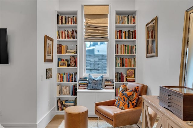 5940 Magazine St Unit 102, New Orleans, LA 70115 - living area featuring wood finished floors and built in features