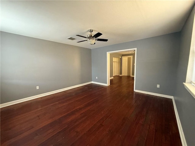 482022 Dauphine St, New Orleans, LA 70117 - spare room featuring dark wood finished floors and ceiling fan