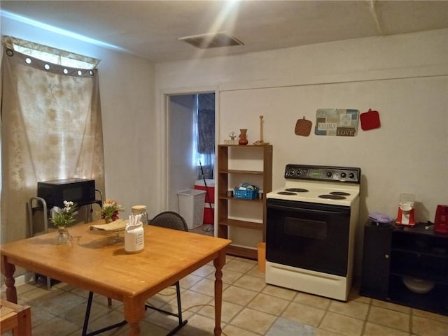 482022 Dauphine St, New Orleans, LA 70117 - dining area featuring light tile patterned flooring