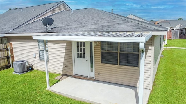 1700 Marseille Dr Unit 16, La Place, LA 70068 - rear view of property with roof with shingles and a patio area