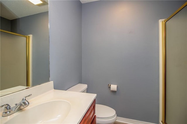 1700 Marseille Dr Unit 16, La Place, LA 70068 - bathroom featuring a stall shower, vanity, and a textured ceiling