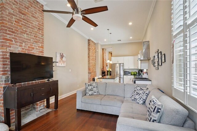 232830 Bienville St, New Orleans, LA 70119 - living room featuring ceiling fan, dark wood-type flooring, ornamental molding, and recessed lighting