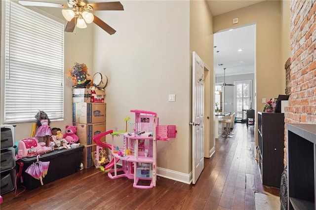 232830 Bienville St, New Orleans, LA 70119 - playroom with a ceiling fan and hardwood / wood-style flooring