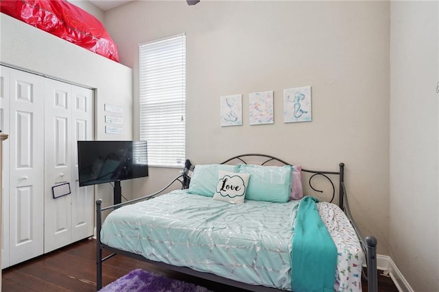232830 Bienville St, New Orleans, LA 70119 - bedroom with wood finished floors and a closet