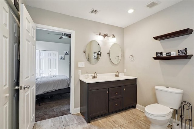 232830 Bienville St, New Orleans, LA 70119 - ensuite bathroom featuring double vanity and a ceiling fan