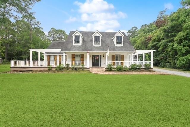 107 Quail St, Slidell, LA 70460 - view of front of property featuring a porch and a front yard