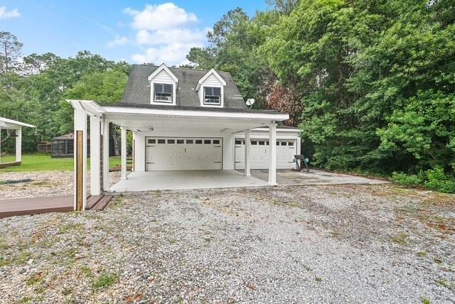 107 Quail St, Slidell, LA 70460 - garage featuring a detached garage