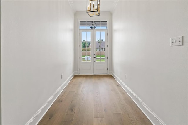 1337 Avenue Lacroix Ave, Lacroix, Covington, LA 70433 - doorway to outside with ornamental molding, wood finished floors, a chandelier, and french doors