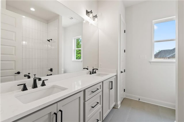 1337 Avenue Lacroix Ave, Lacroix, Covington, LA 70433 - bathroom with double vanity, tiled shower, and recessed lighting