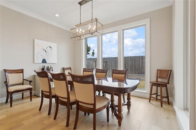1193 Delta Ln, Covington, LA 70433 - dining room featuring ornamental molding, light wood-style flooring, a chandelier, and recessed lighting