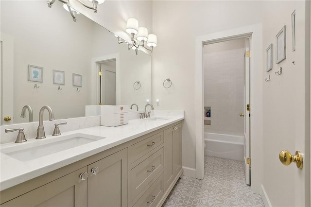 1193 Delta Ln, Covington, LA 70433 - bathroom with double vanity, shower / bath combination, tile patterned floors, and a chandelier