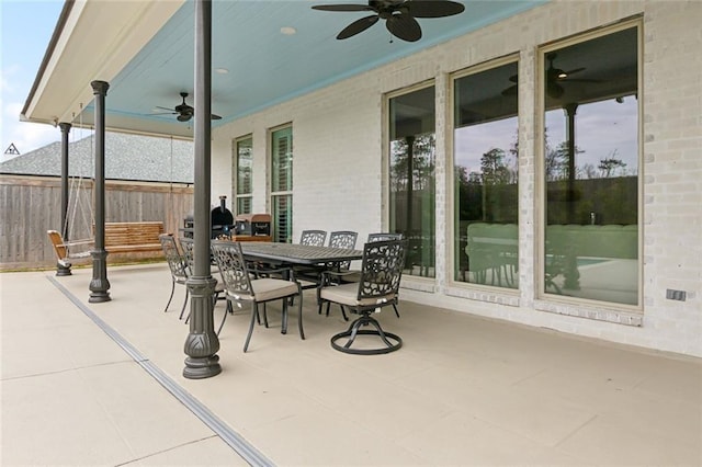 1193 Delta Ln, Covington, LA 70433 - view of patio with a ceiling fan and outdoor dining space